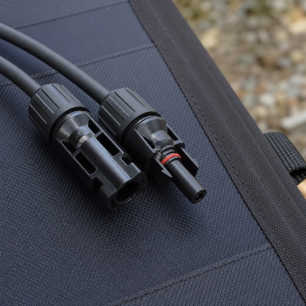 Close-up of MC4 connector on a portable solar panel